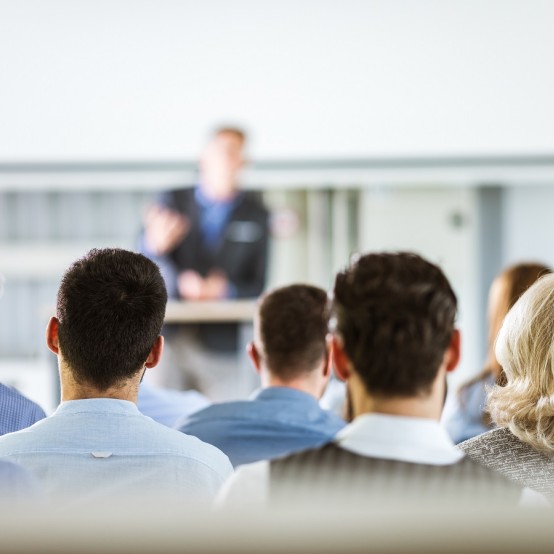 Audience looking at a speaker